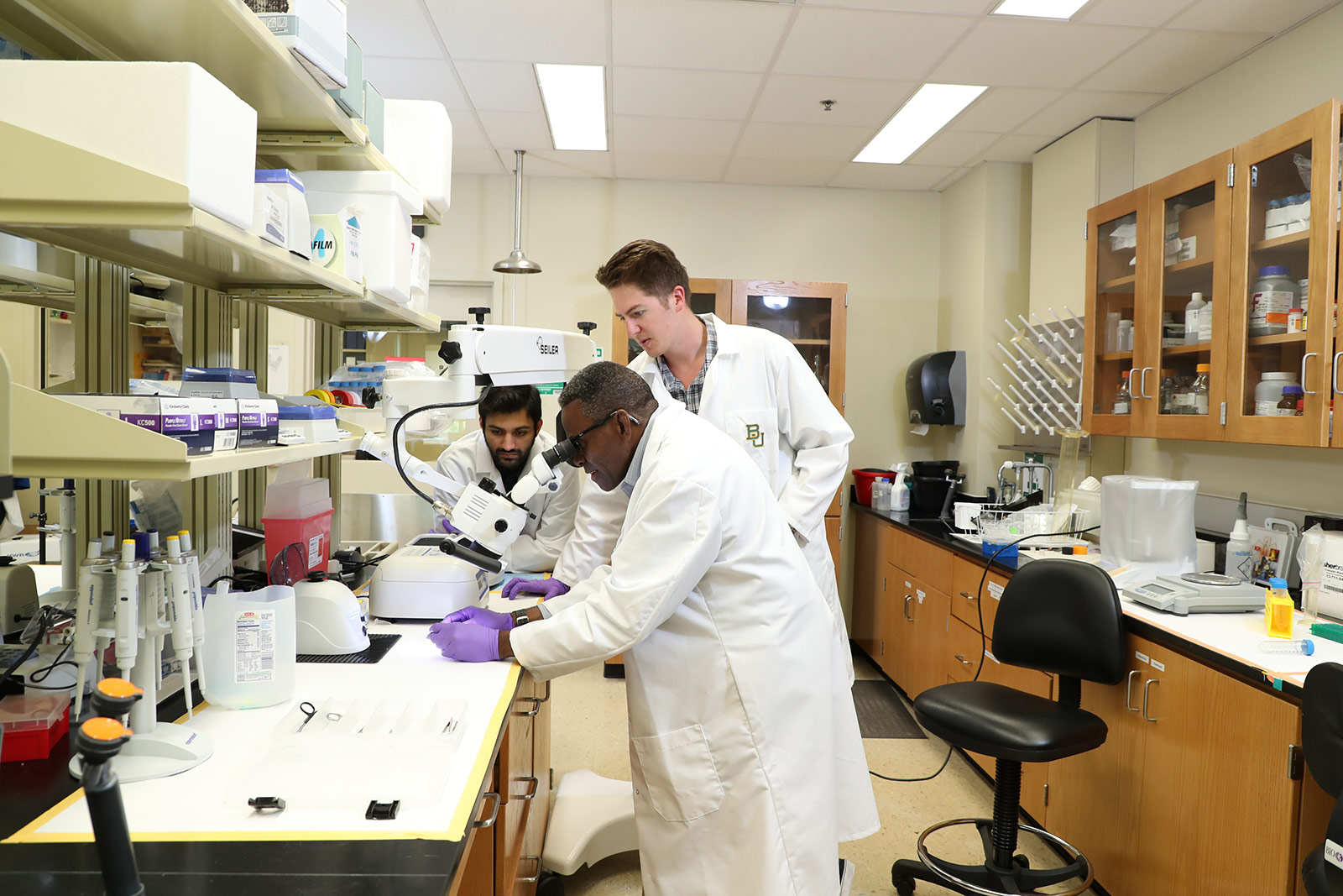 Researchers in lab